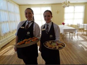 Sarah T and Mary waitstaff at Stevens Estate Wedding